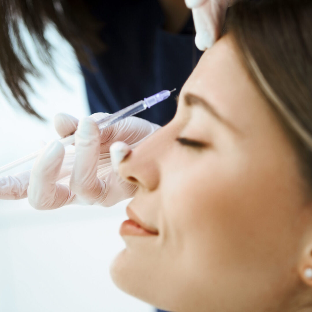 Woman receiving botox injection